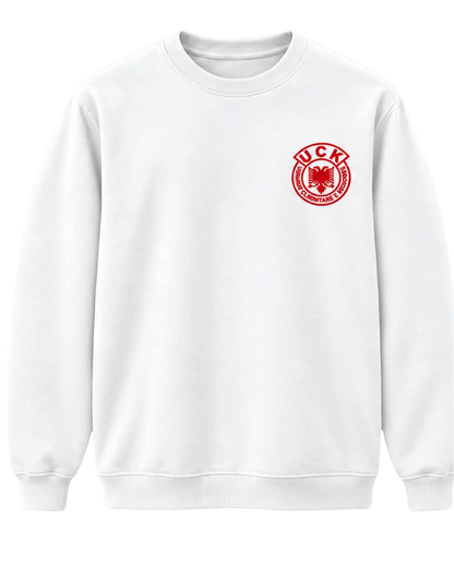 Front of the white Jo në emrin tim sweatshirt with the red UÇK emblem on the left chest